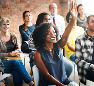 A group of diverse audience in a meeting